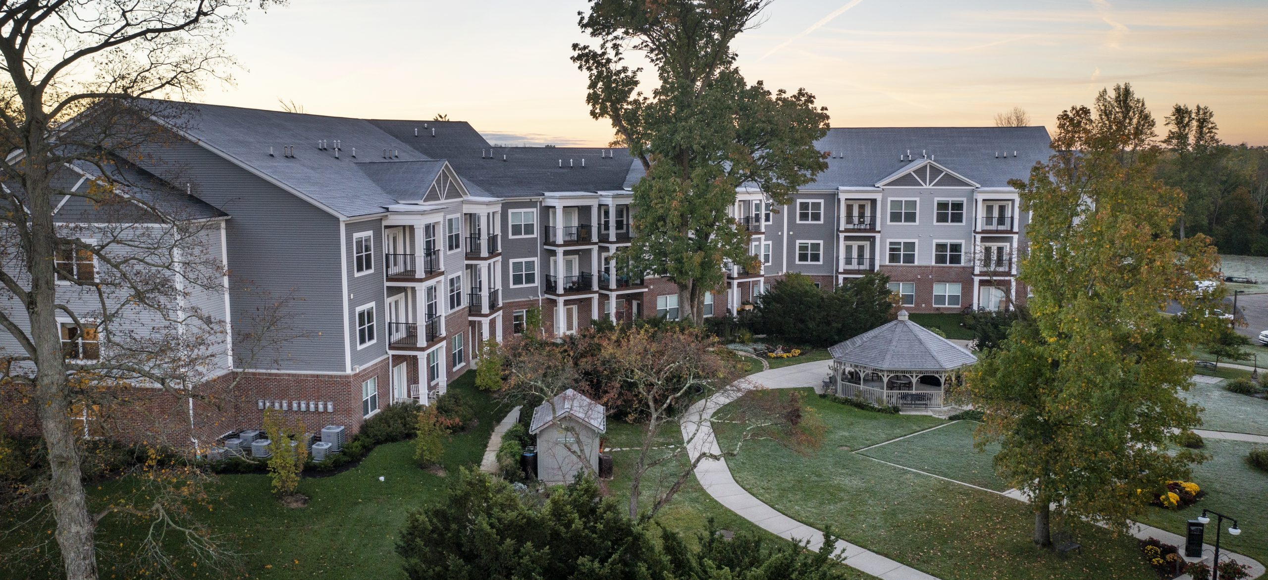 Legacy Village exterior with gazebos and walking path