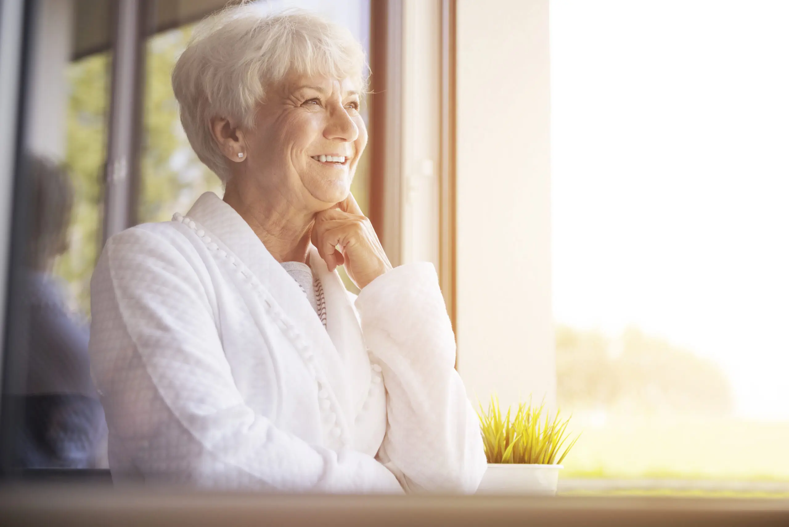 A happy senior enjoying the benefits of independent living services.